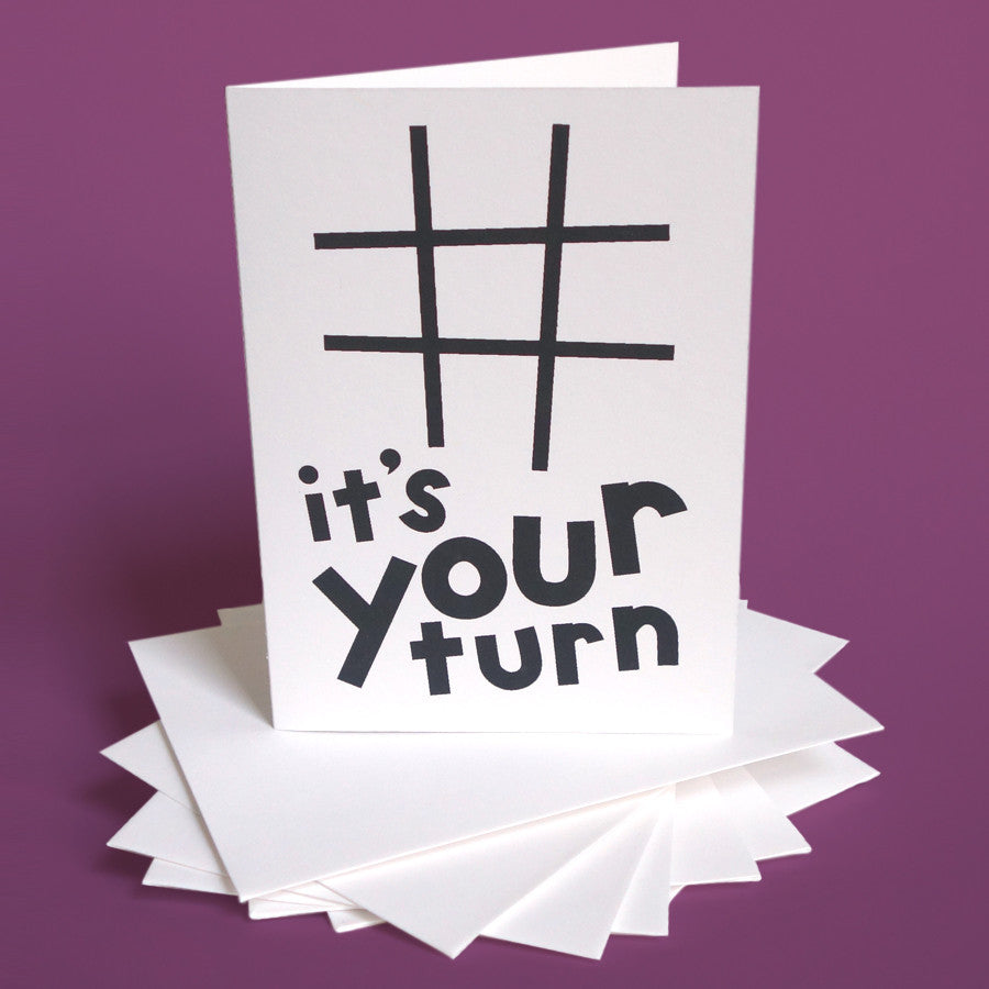 Greeting card with playful typography that says "It's Your Turn"